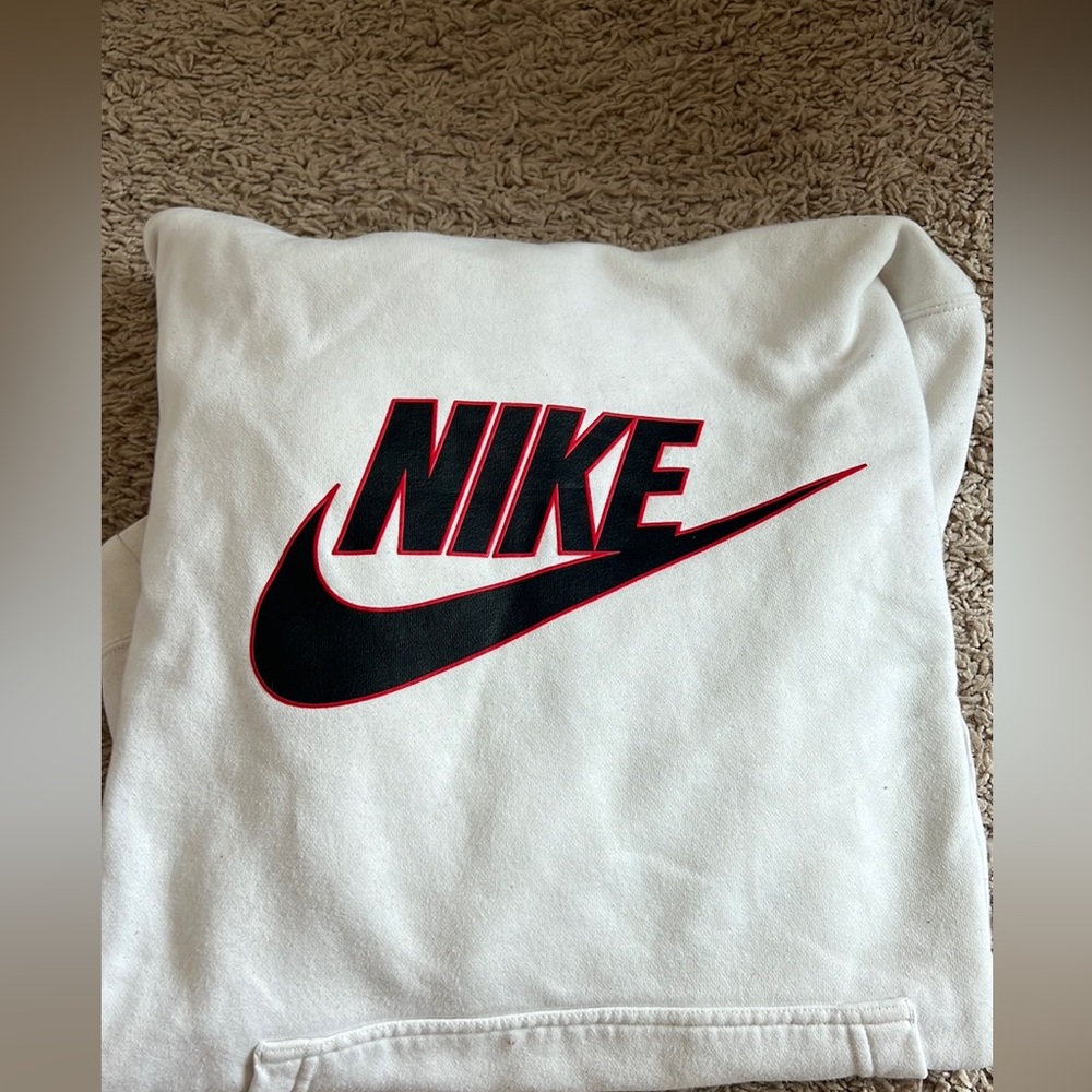 Nike sweatshirt. White with black and red lettering